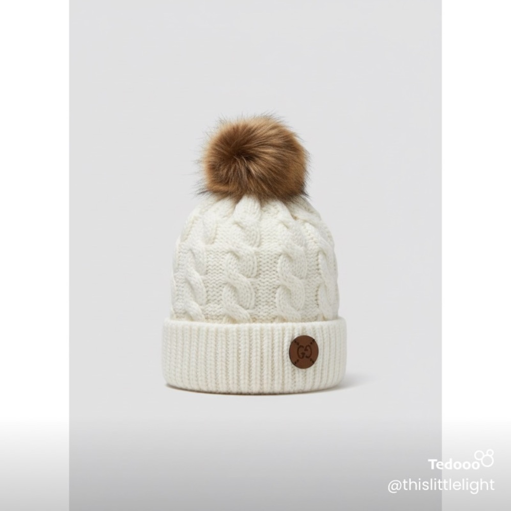 Cozy White Knit Pom-Pom Beanie made with upcycled authentic Gucci button